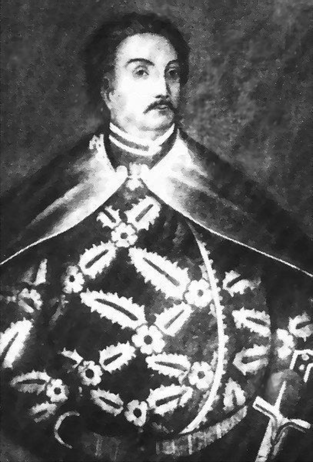 Schwarzes und weißes Foto von Papst Johannes Paul II. in Priesterrobe, der eine schwarze Robe mit weißem Kragen und Manschetten trägt, Hände verschränkt, strenger Gesichtsausdruck, direkter Blick.