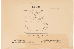 Ein Patentdokument aus dem Jahr 1902 mit einer Zeichnung einer runden Maschine mit einem Griff und einer Spule Garn, begleitet von beschreibendem Text.