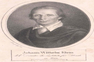 Schwarzes und wei├čes Portr├Ąt von Johann Wilhelm Klein, Direktor des Instituts f├╝r Blinde in Wien, der einen wei├čen Hemd und einen ernsten Gesichtsausdruck tr├Ągt, mit deutschem Text unten.