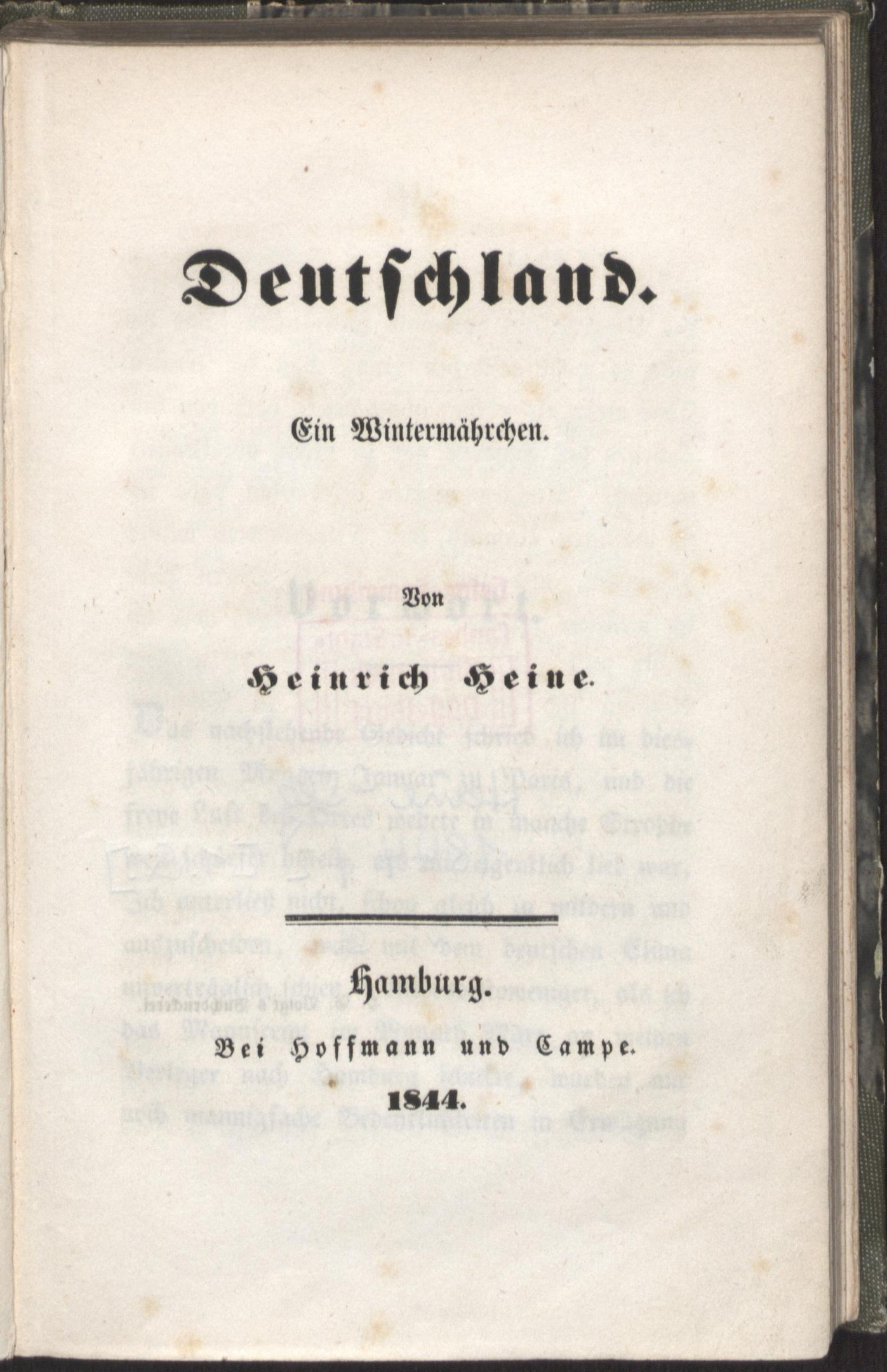 An old book titled "Deutschland" against a black background.