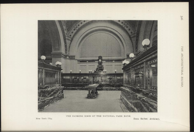 Black and white photograph of the interior banking room of the National Park Bank in New York City, featuring tables, lighting fixtures, and a wall clock, with text at the bottom.