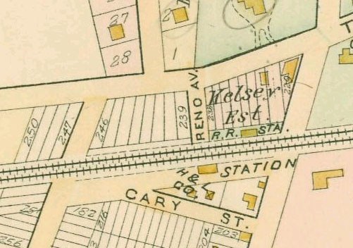 Old map of a densely built city with numbered plots, text annotations, and a "land for sale" notice at the bottom.