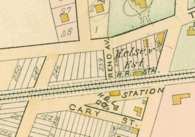 Old map of a densely built city with numbered plots, text annotations, and a "land for sale" notice at the bottom.