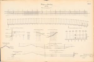 Ein aufgeschlagenes Buch mit einer detaillierten Zeichnung einer Eisenbahnstrecke und Text, das einen Überblick über das Eisenbahnsystem gibt.