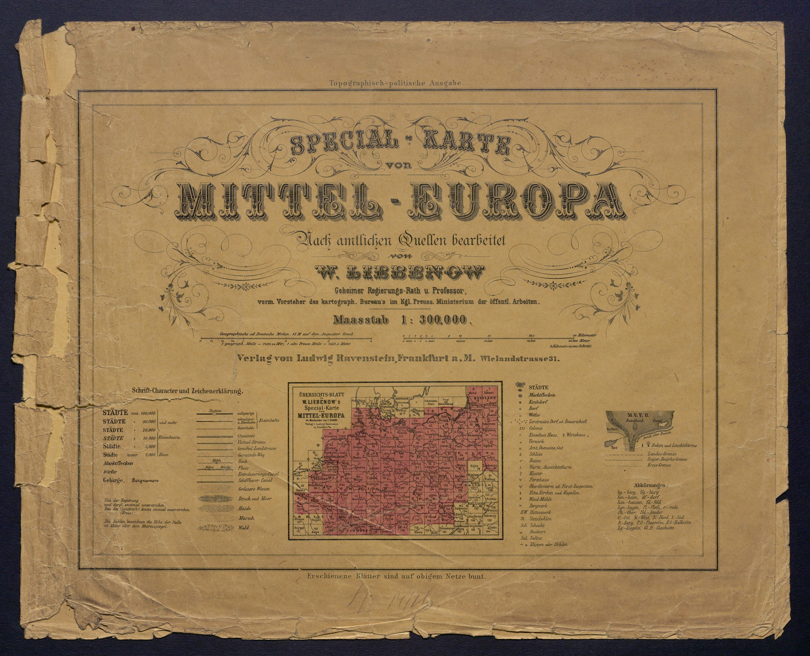 Old book with a detailed map of Mittel-Europa, including cities and towns, displayed on a dark background.