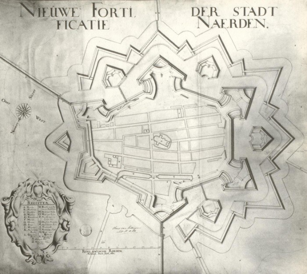 Detailed map of Niederlande, Germany, on paper with street names, buildings, landmarks, and accompanying text.