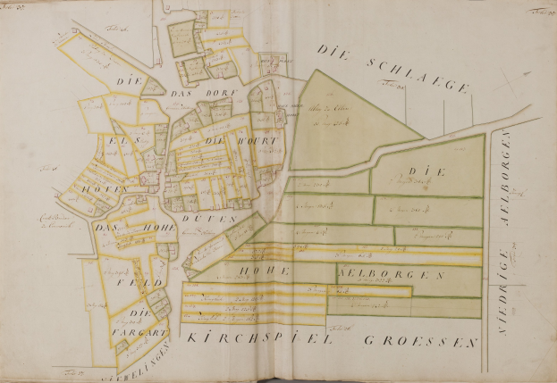 An old book featuring a detailed map of Hamburg, Germany, with text providing information about the city's population, streets, and landmarks.