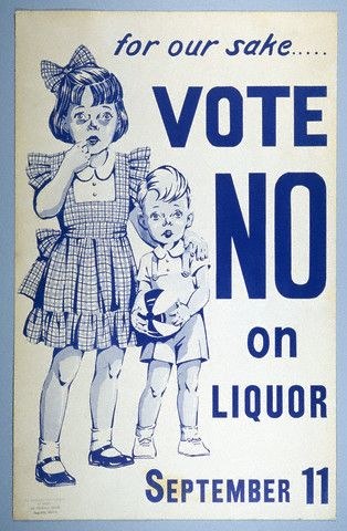 Poster on a wall with two children standing side by side, one holding a ball, reading "Vote No on Liquor" in bold black letters.