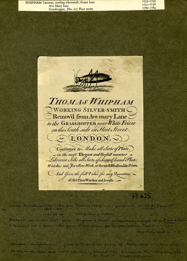 Ein altes Buch mit einer Zeichnung einer Heuschrecke auf dem Cover und Text auf den Seiten.