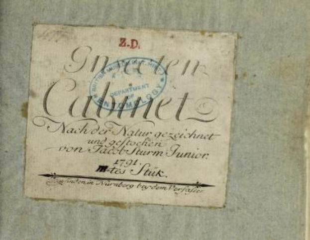 Old book titled "Z.D. Nuremberg, Germany, 1791" with a stamp indicating it is the first edition, and handwritten text on its pages.