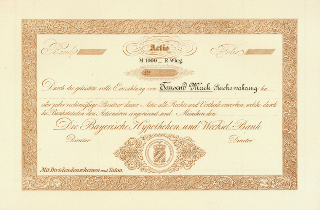 Altes Aktienzertifikat mit goldenem Rand, das ein Portr├Ąt eines Mannes und Text zeigt, wahrscheinlich eine Anleihe.