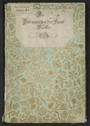 Old book with floral cover design and title "Die Betrugereierten des Bank furfs" on black background.