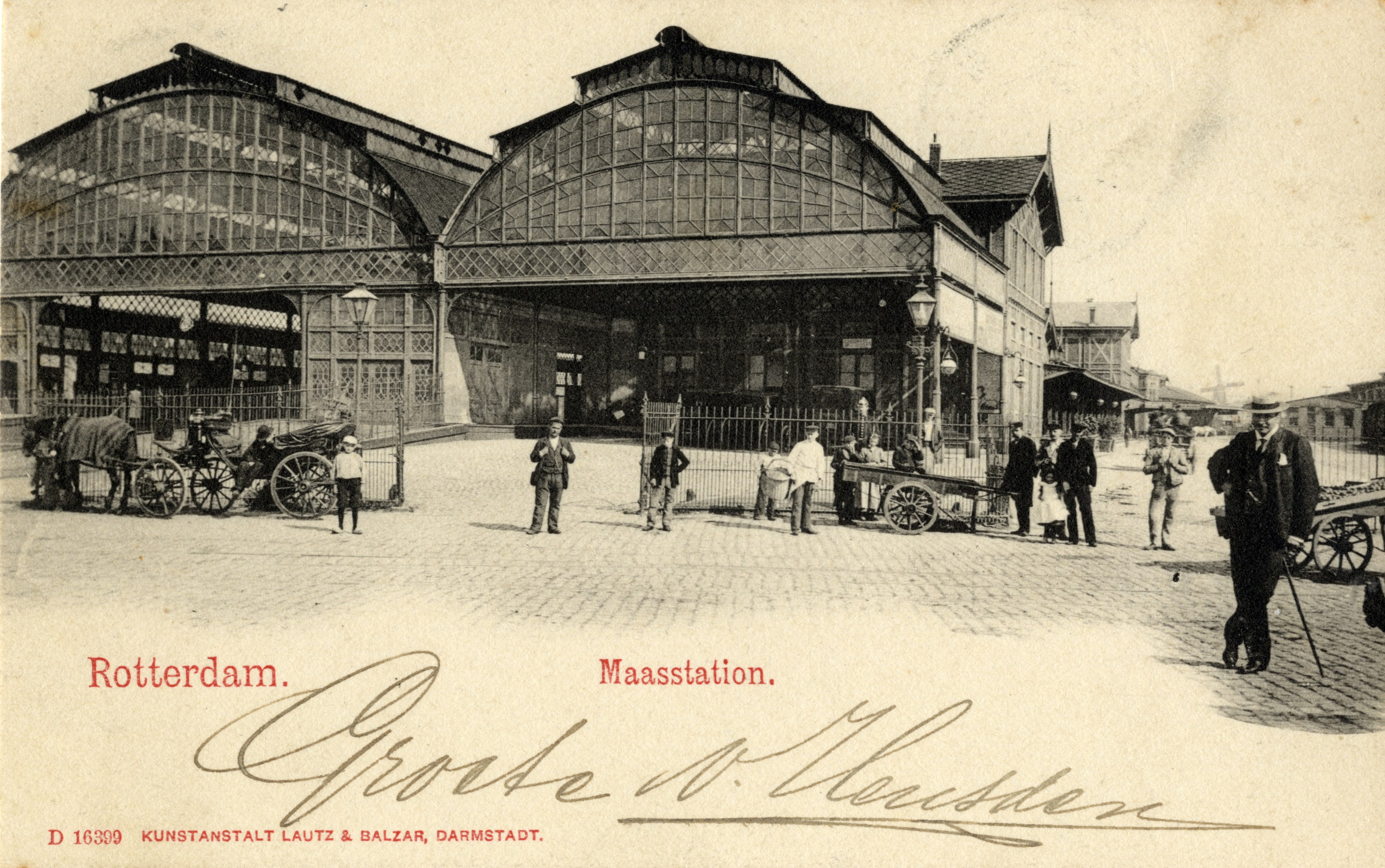 Old postcard of a train station in Rotterdam, Netherlands, showing people with carts, horse carts, street poles, buildings, and a cloudy sky.