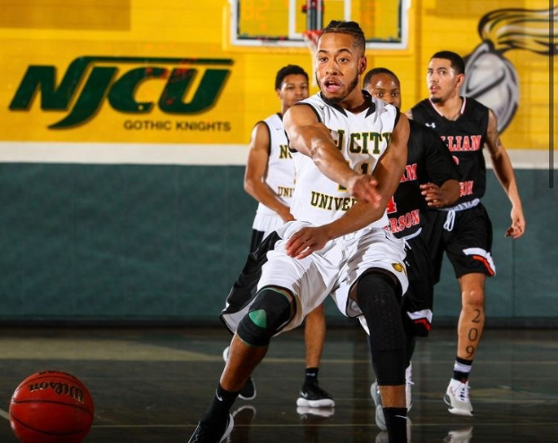 Men playing basketball on a court with a wall displaying "NCU Men's Basketball" and the date February 22nd, 2020.