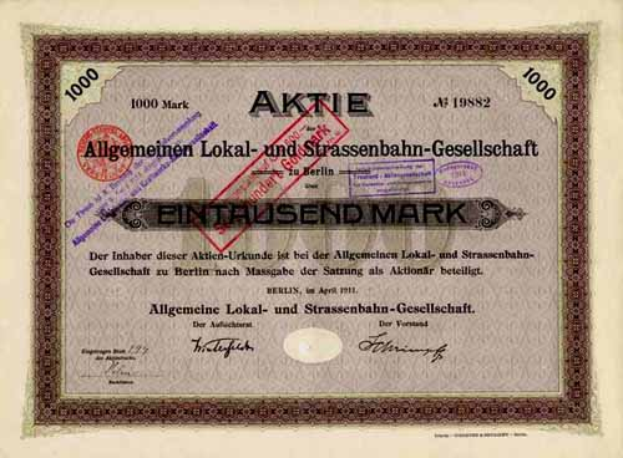 Ein altes deutsches Wertpapier, das von der deutschen Regierung ausgegeben wurde, mit Text und Zahlen.